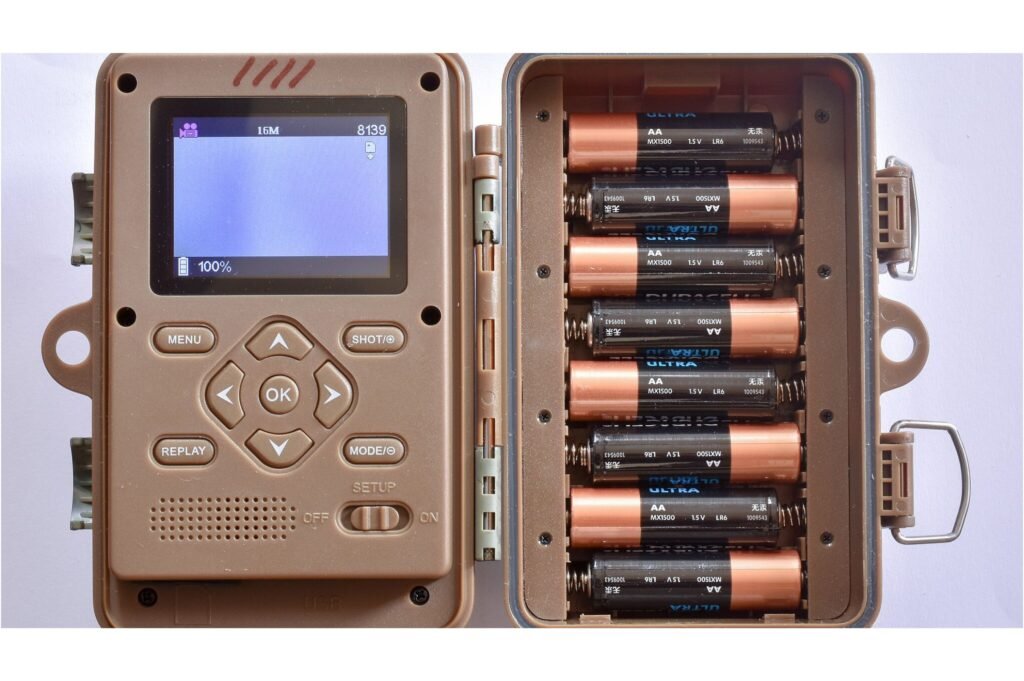Campark Trail T70 with exposed batteries.