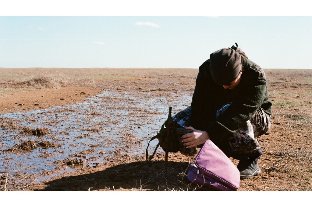 Setting up a camera trap.