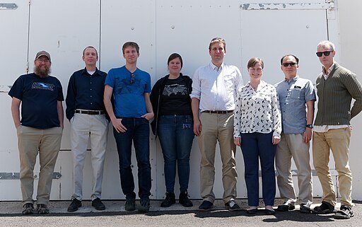 Group of people standing together outside