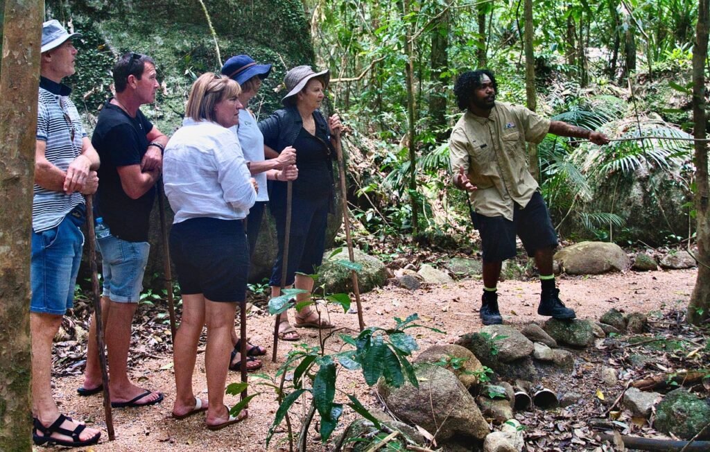 Tour guide with group in a forest