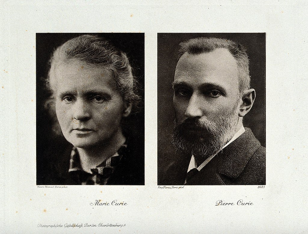 Portraits of Marie Curie and Pierre Curie.