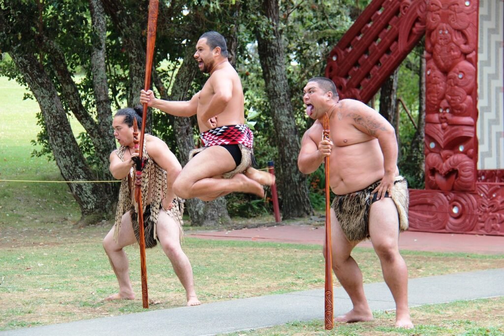 Maori men leap jump.