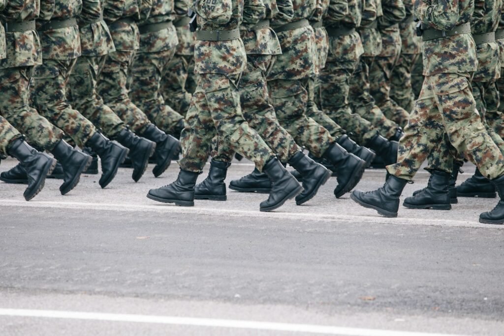 Soldiers marching in sync.