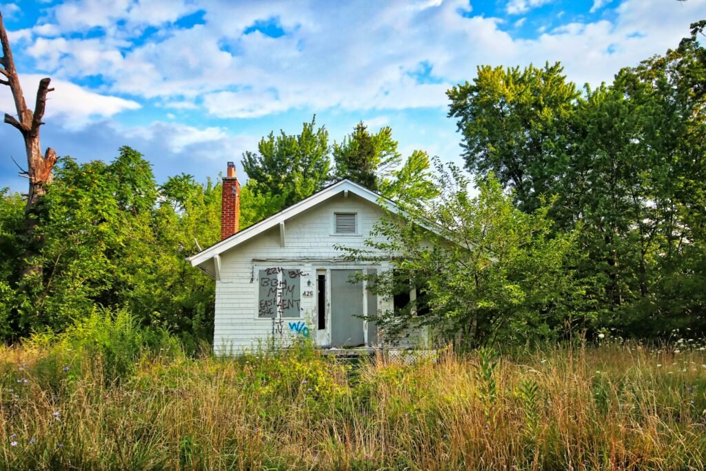 Bungalow with grass out front.