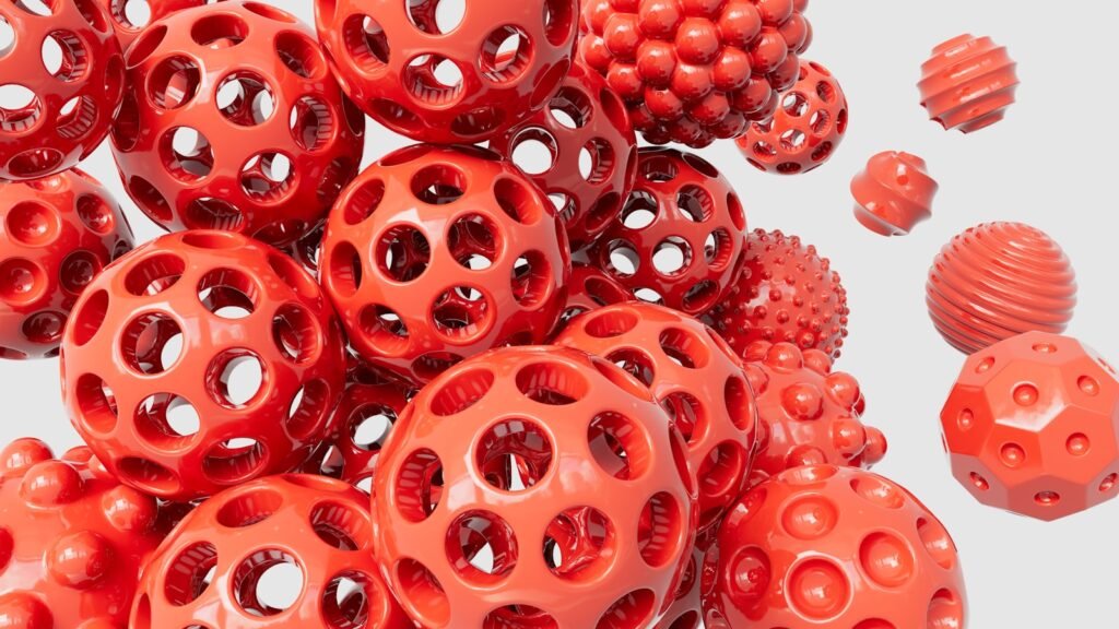A pile of red 3D-printed spheres.