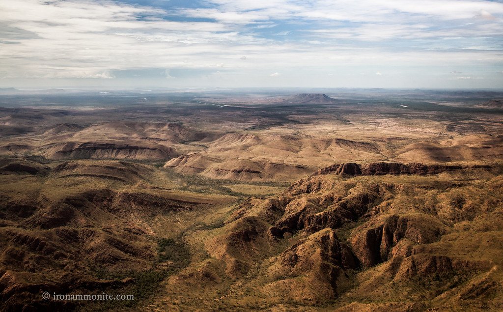 Flying over the spectacular rolling hills of the North East Kimberleys, Australia - 5D+24mm through a plane window. 