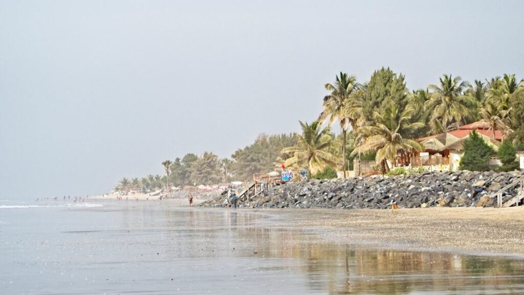 Beach near houses in The Gambia.