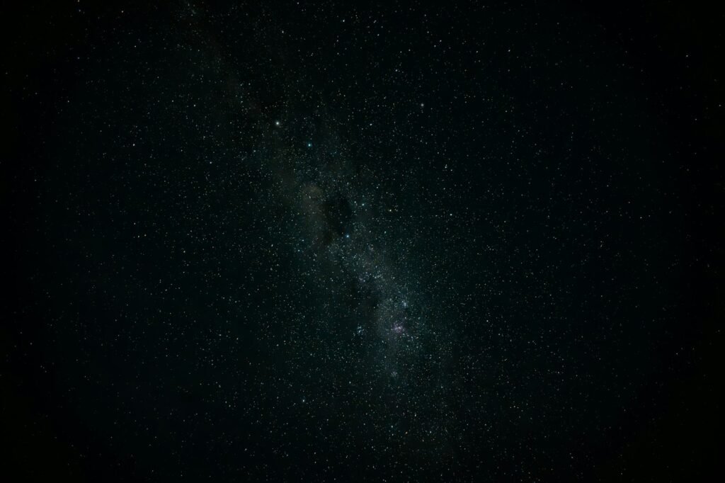 A dark sky filled with lots of stars