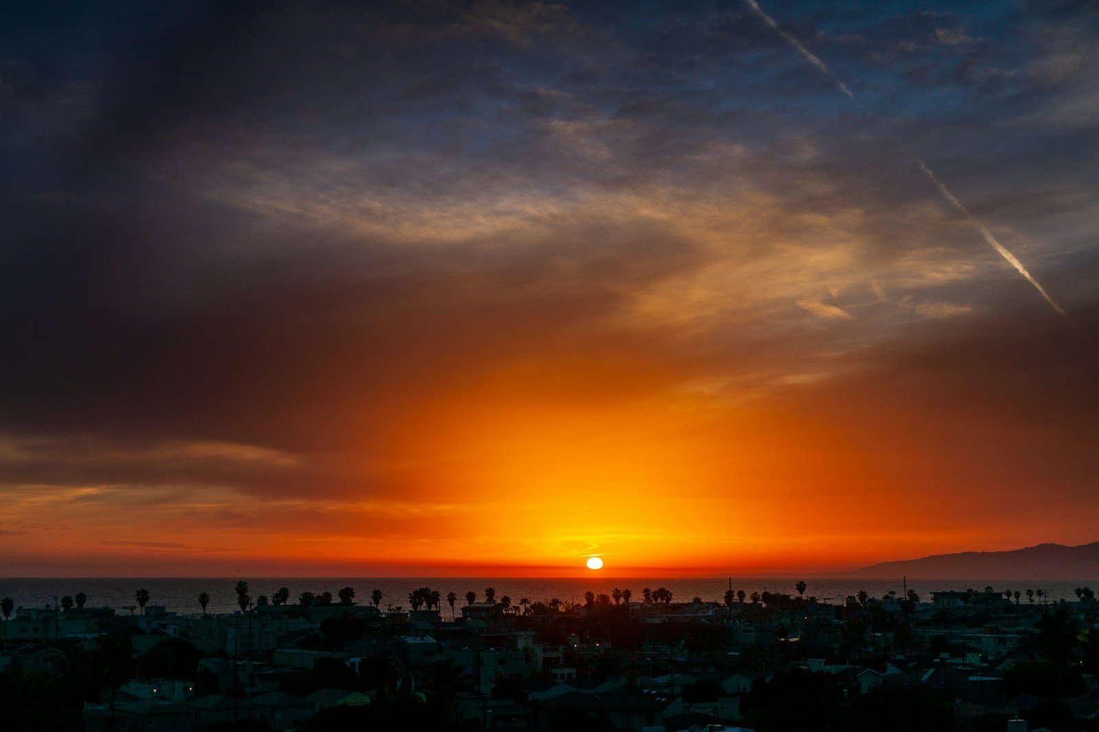 Horizon with scattered earthquake lights during sunset.