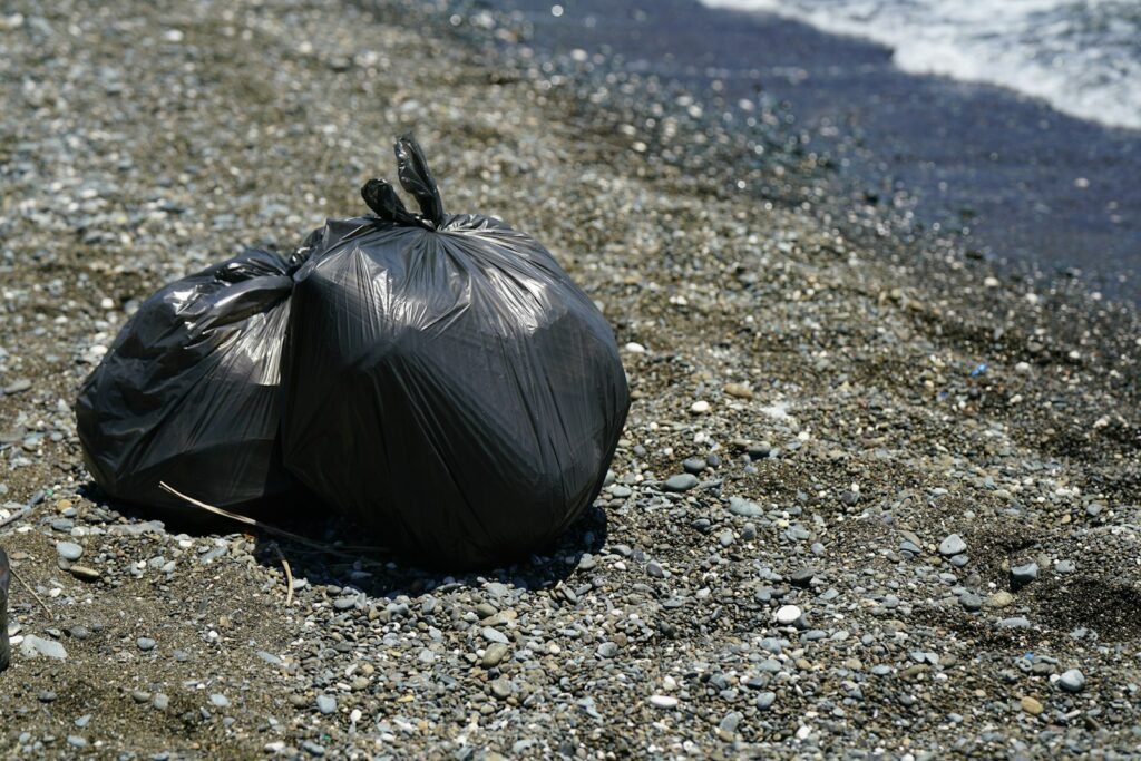 Microplastics in the surroundings with garbage bag.