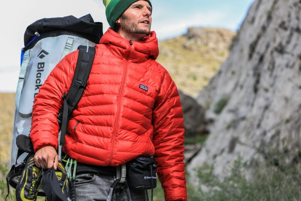 Man wearing Patagonia clothes while on a hike.