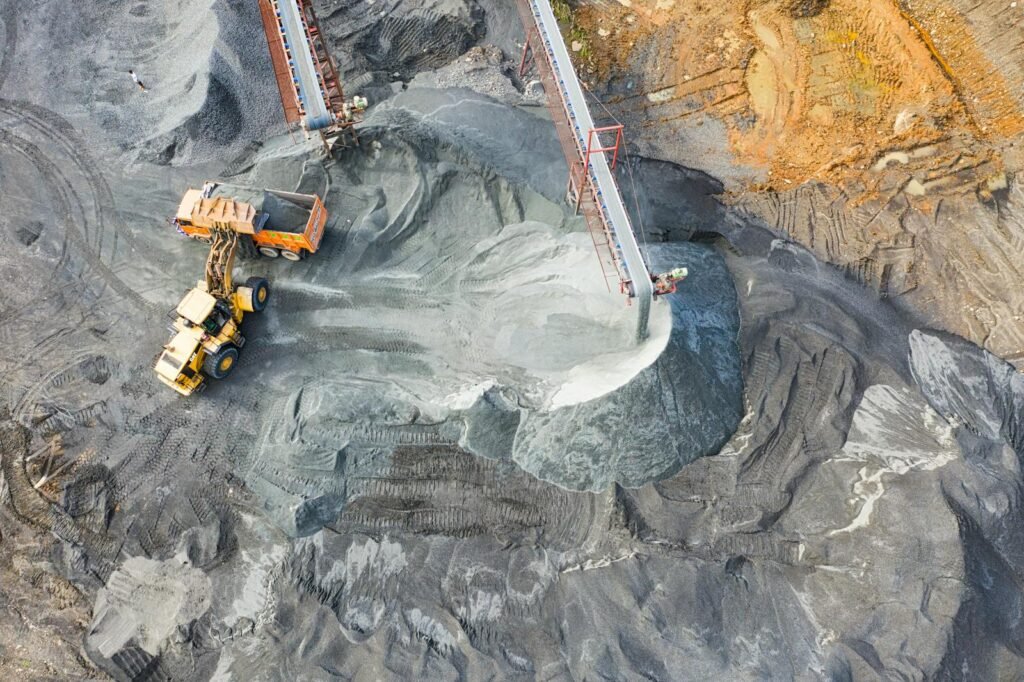 A view showcasing mining operations with excavators and conveyor belts.