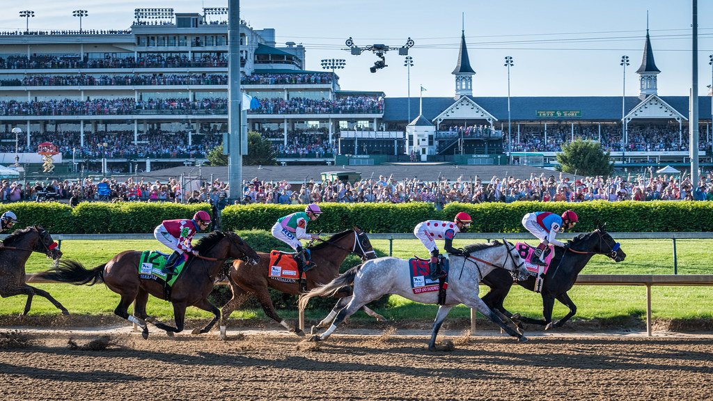 Number Eight Medina Spirit leads at Kentucky Derby.
