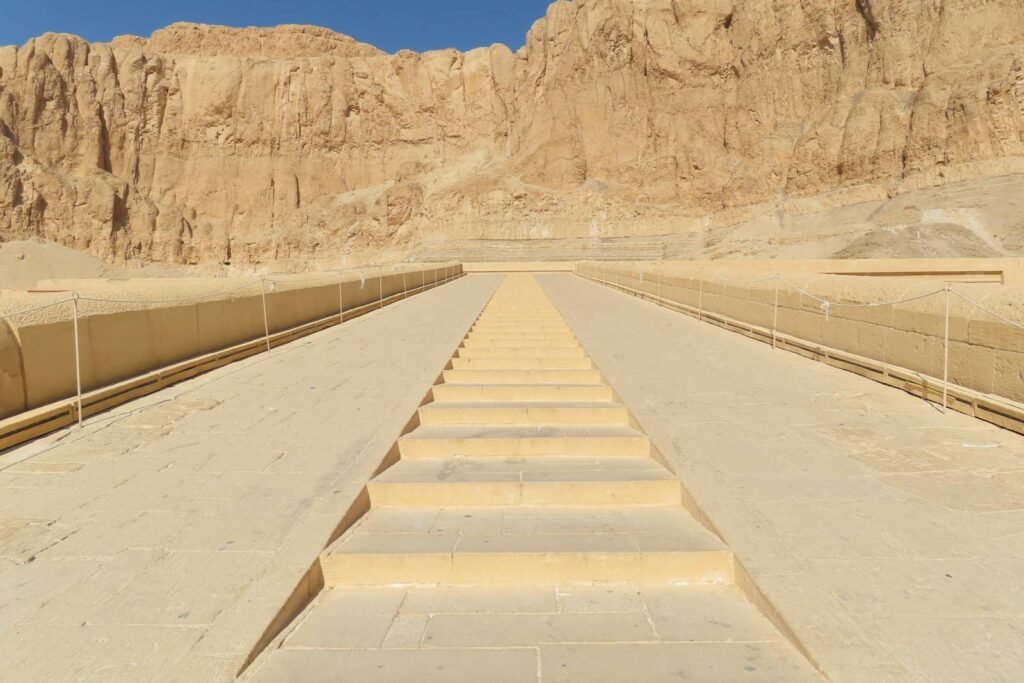 Stone steps at Hatshepsut Temple in Luxor, revealing ancient Egyptian architecture.