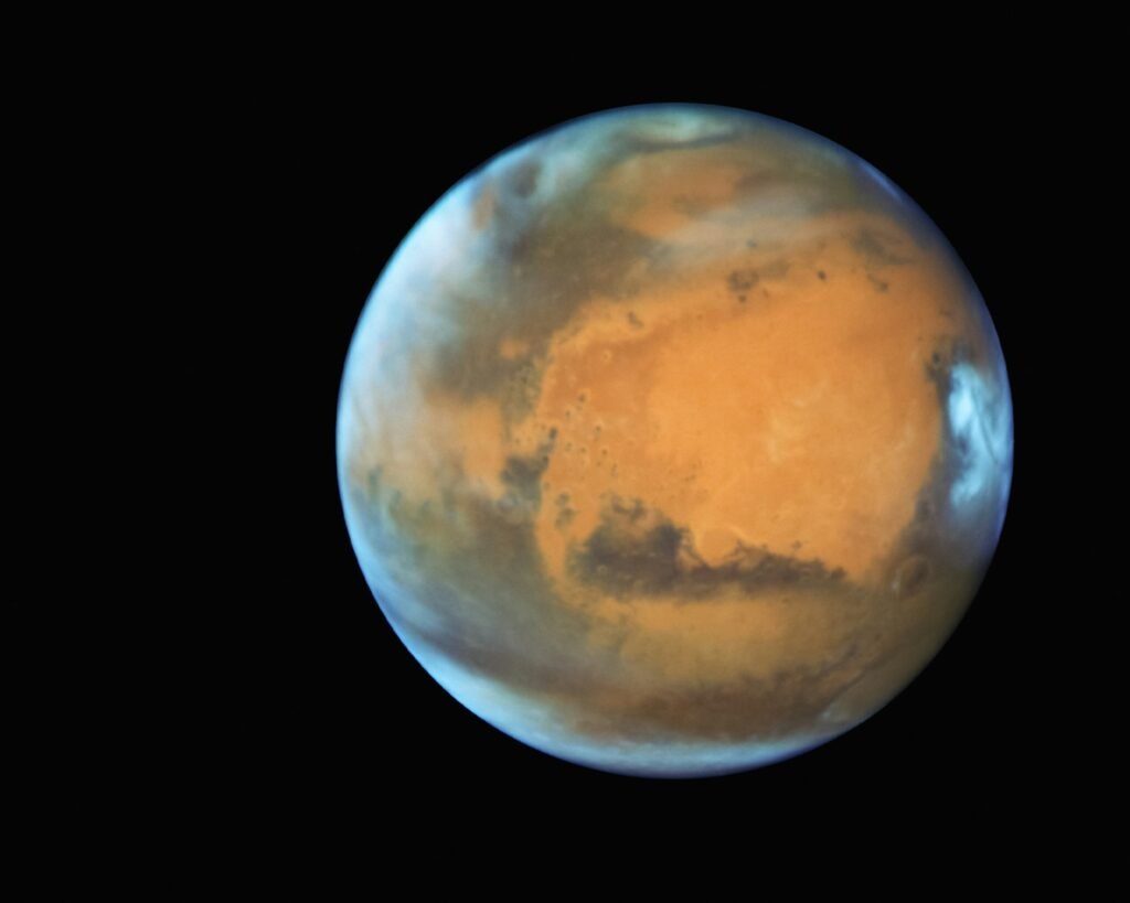a red planet with a black background