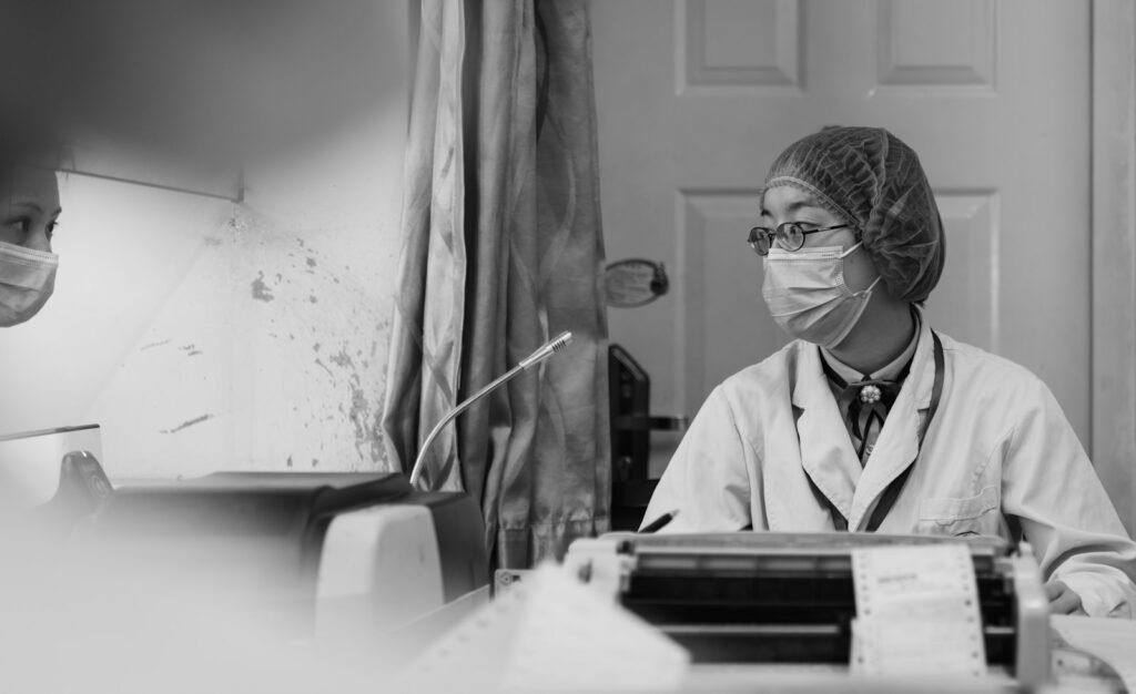 Scientist in full protective gear.