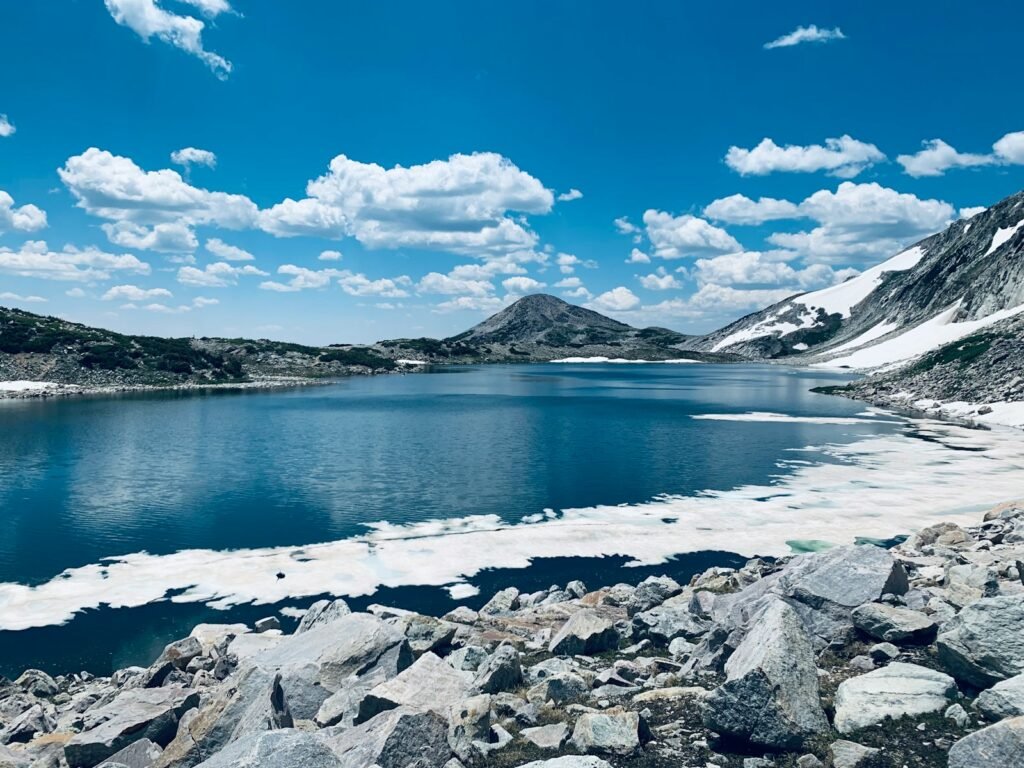 a large body of water surrounded by rocks