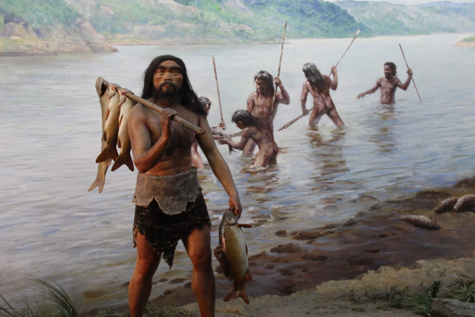 Conclusion: A Humbling Reality Check (image credits: Paleolithic Man Diorama, CC0, https://commons.wikimedia.org/w/index.php?curid=101566083)