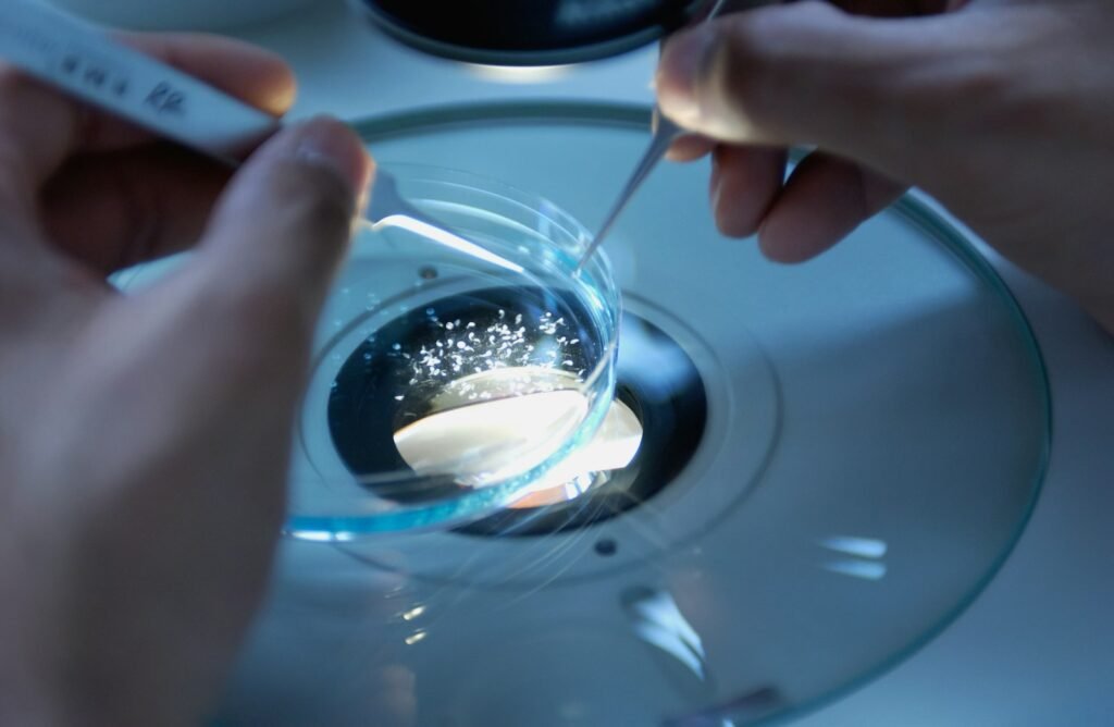 scientist observing through glass