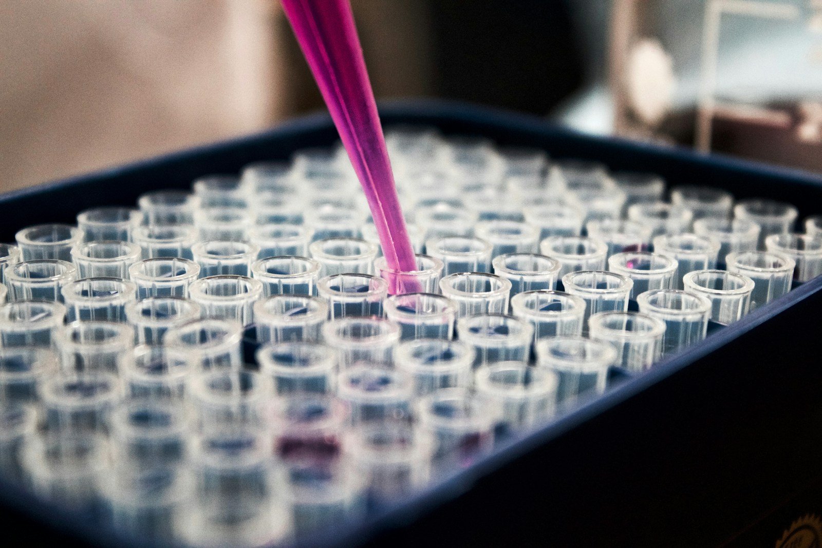 A scientist contemplating ethical implications of stem cell research in a laboratory setting.
