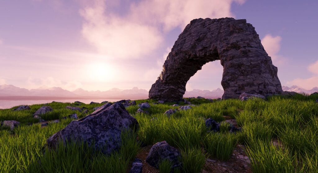 An arch-shaped rock formation sits on a grassy hill.