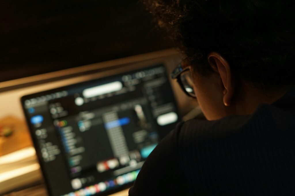 a man looking at a computer screen