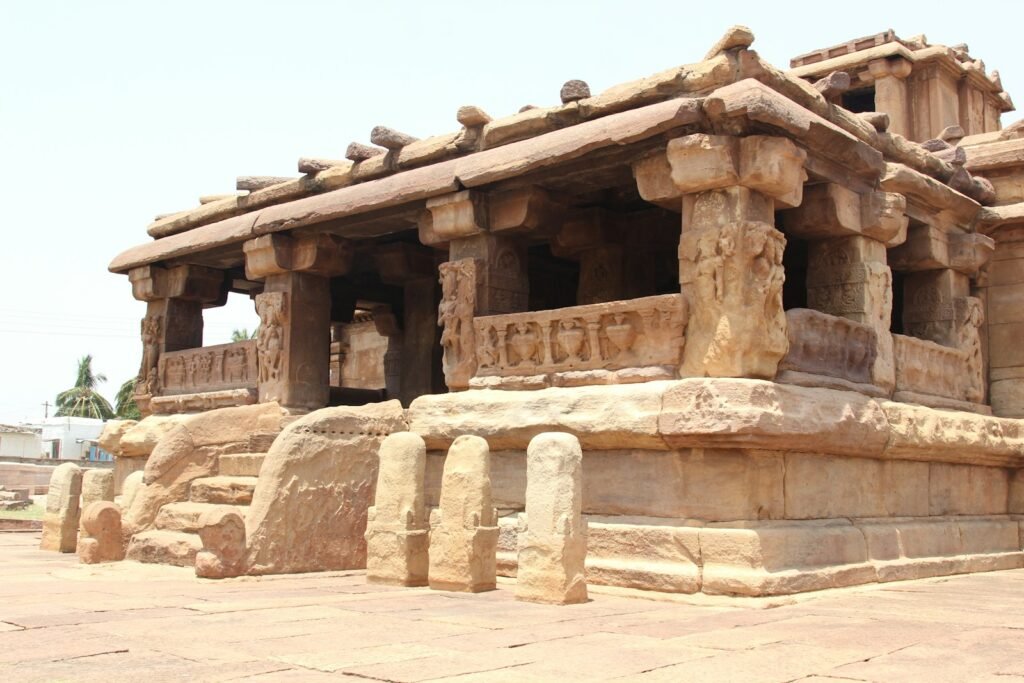 a stone structure with carvings on the sides of it