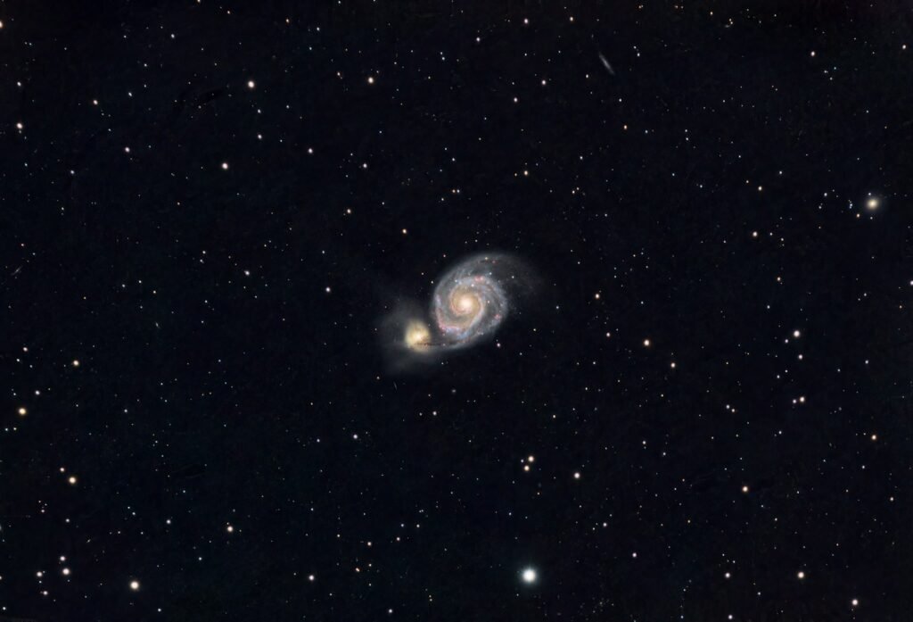 white and blue planet on black sky