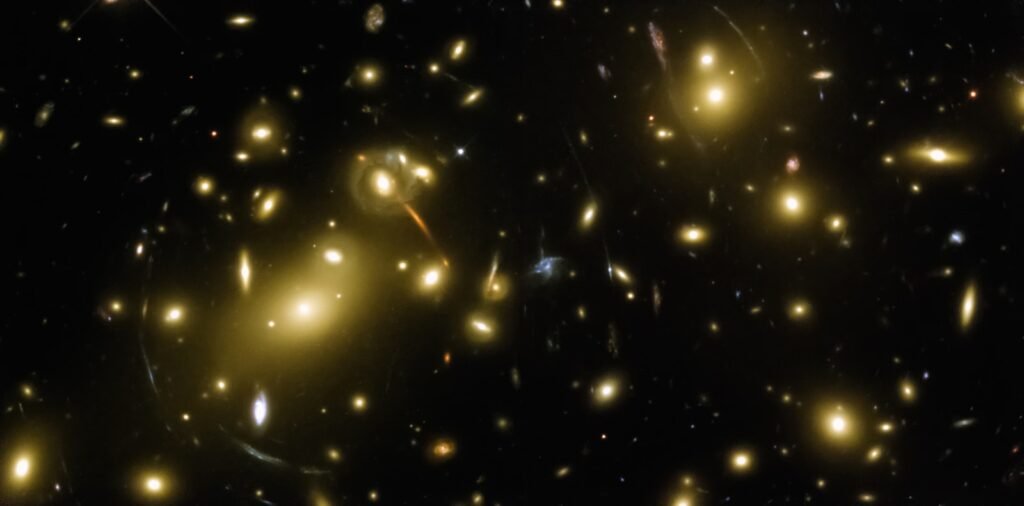 a cluster of yellow lights in the dark