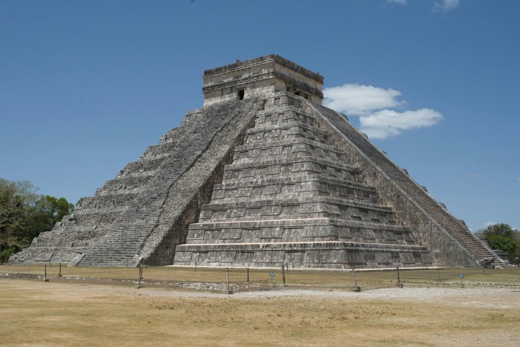 The mayan pyramid of chichen itza stands tall.