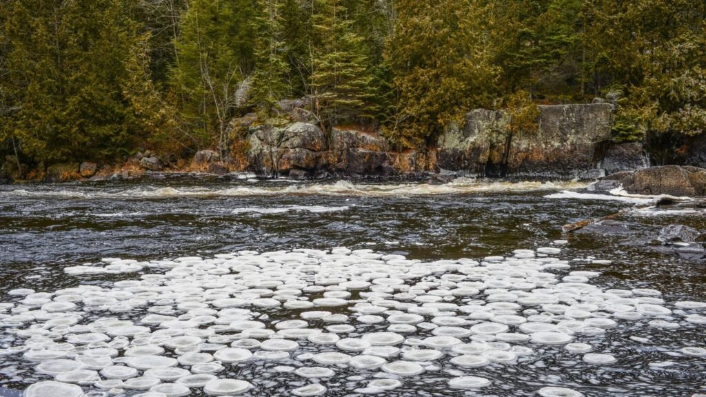Strange Circular Ice Formations Appearing on Frozen Midwestern Lakes