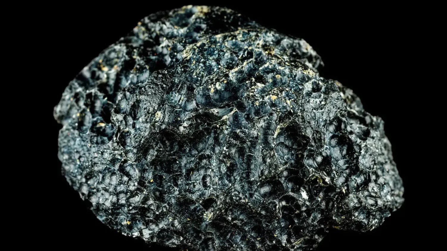 Scientists Find Glass Orbs That Point to Ancient Asteroid Impact but Crater Remains Missing