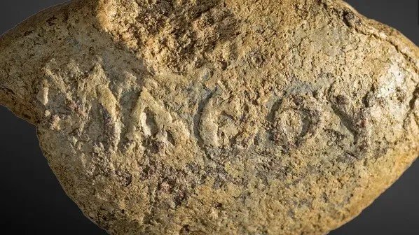A 2,000-Year-Old Sling Bullet Carried a Chilling Warning Written Across Its Surface