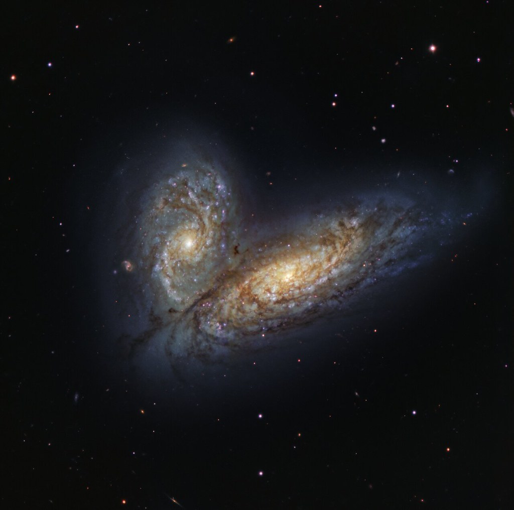 Cosmology Says Two Galaxies Can Pass Directly Through Each Other Without a Single Star Colliding - Because the Space Between Stars Is So Vast That Matter Is Mostly Absence and the Collision Is Almost Entirely Empty