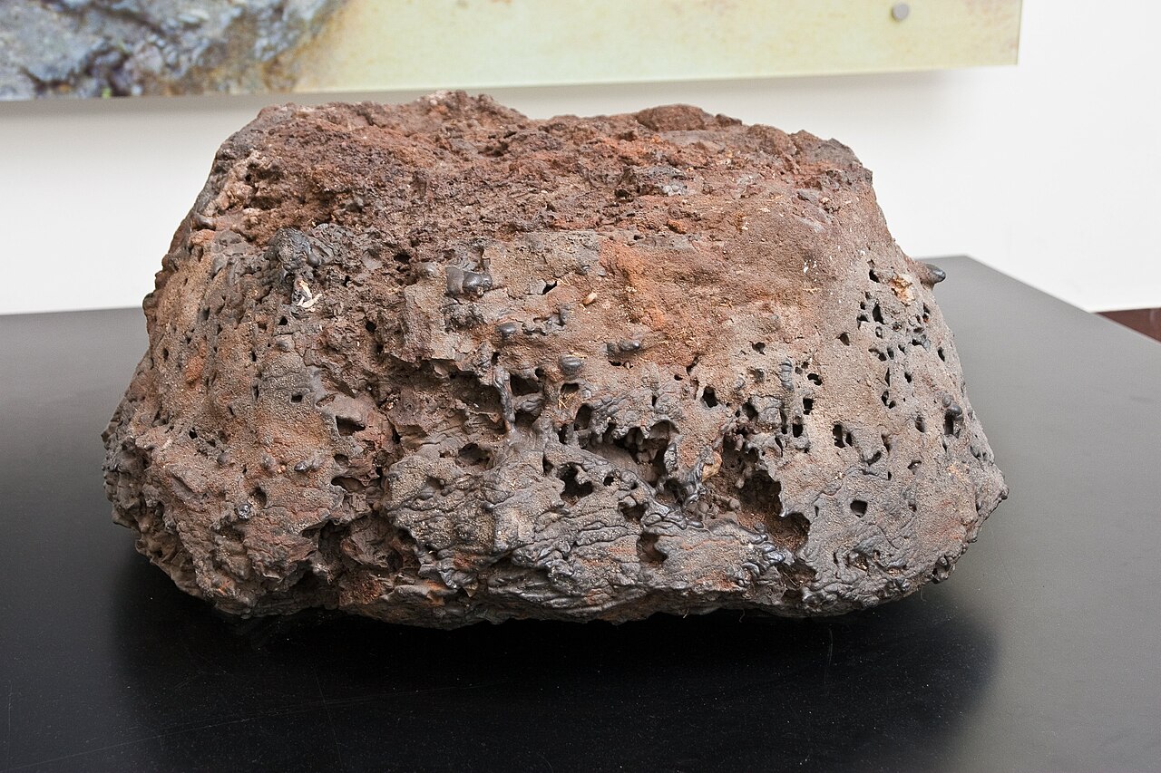 #10 - Ancient Metal-Smelting Slag That Reads Like Deliberate Glass